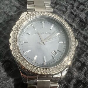 Michael Kors women’s stainless steel watch, light blue face, Chrystal accent